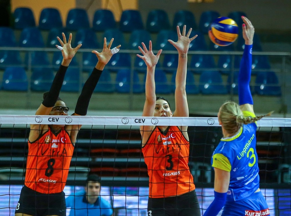 Eczacu0131bau015fu0131 VitrA defeated SSC Palmberg at Istanbul's Burhan Felek Sports Facility. Eczacu0131bau015fu0131 VitrA's Tijana Boskovic (C) and Rachael Adams (L) in action against Loissa Lippman (R) of SSC Palmberg.