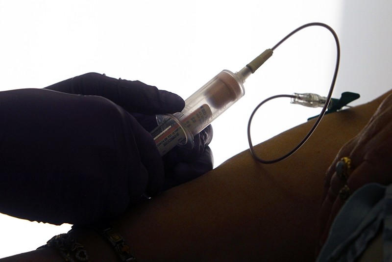 In this April 28, 2015 file photo, a patient has her blood drawn for a liquid biopsy during an appointment at a hospital in Philadelphia. (AP Photo)