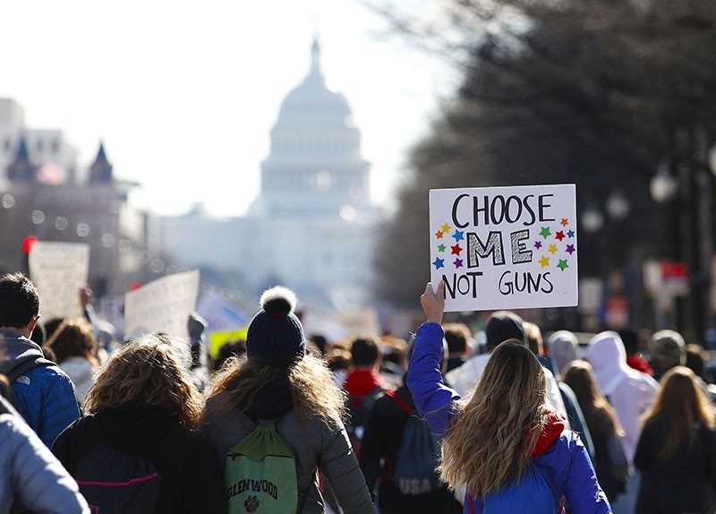After a rally in front of the White House, students march up Pennsylvania Avenue toward Capitol Hill in Washington, Wednesday, March 14, 2018. (AP Photo)