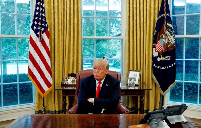 U.S. President Donald Trump reacts to a question during an interview with Reuters in the Oval Office of the White House in Washington, Aug. 20, 2018. (Reuters Photo)