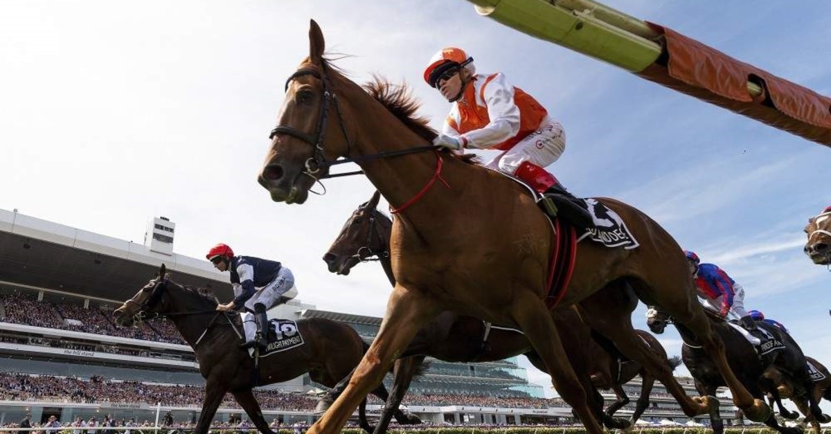 Jockey Craig Williams, front, rides Vow and Declare to victory in the Melbourne Cup, Nov. 5, 2019. (AP Photo)