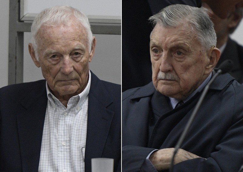 Ford's former executives Pedro Muller (L) and Hector Francisco Jesus Sibilla (R) waits for the veredict in the trial at a court in San Martin, Buenos Aires, on December 11, 2018. (AFP Photos)