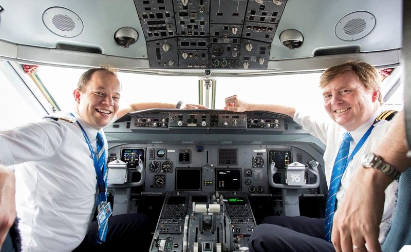 King of the Netherlands Willem-Alexander, right, in the cockpit of a plane. (DHA Photo)