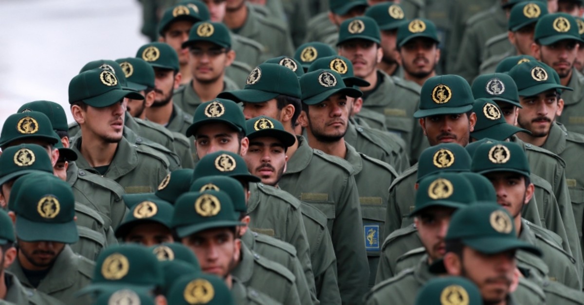  In this Feb, 11, 2019 file photo, Iranian Revolutionary Guard members arrive for a ceremony celebrating the 40th anniversary of the Islamic Revolution, at the Azadi, or Freedom, Square, in Tehran, Iran. (AP Photo)