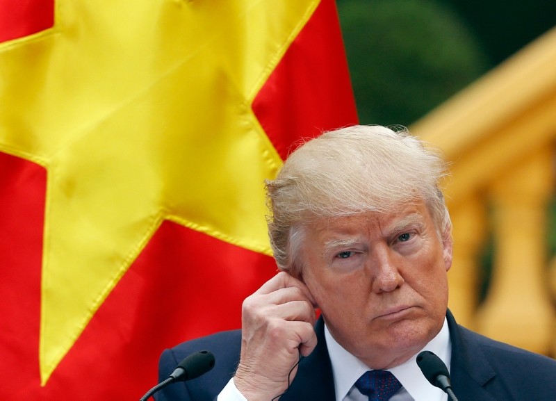In this Nov. 12, 2017, file photo, U.S. President Donald Trump attends a press conference at the Presidential Palace in Hanoi, Vietnam. (AP Photo)