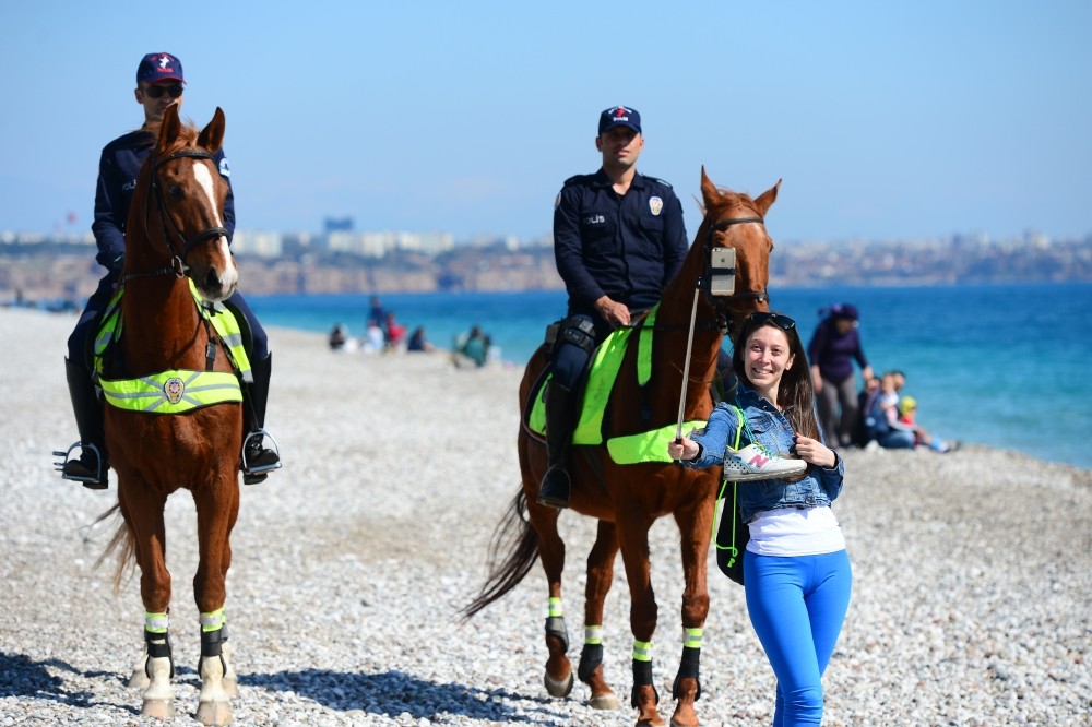 Mounted police ensure safety at Antalya's beaches Daily Sabah
