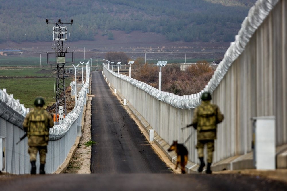 The ,Turkish Wall,, which was built on the Syrian border due to security reasons, is being patrolled by troops along the 900-kilometer (559-mile) long corridor.