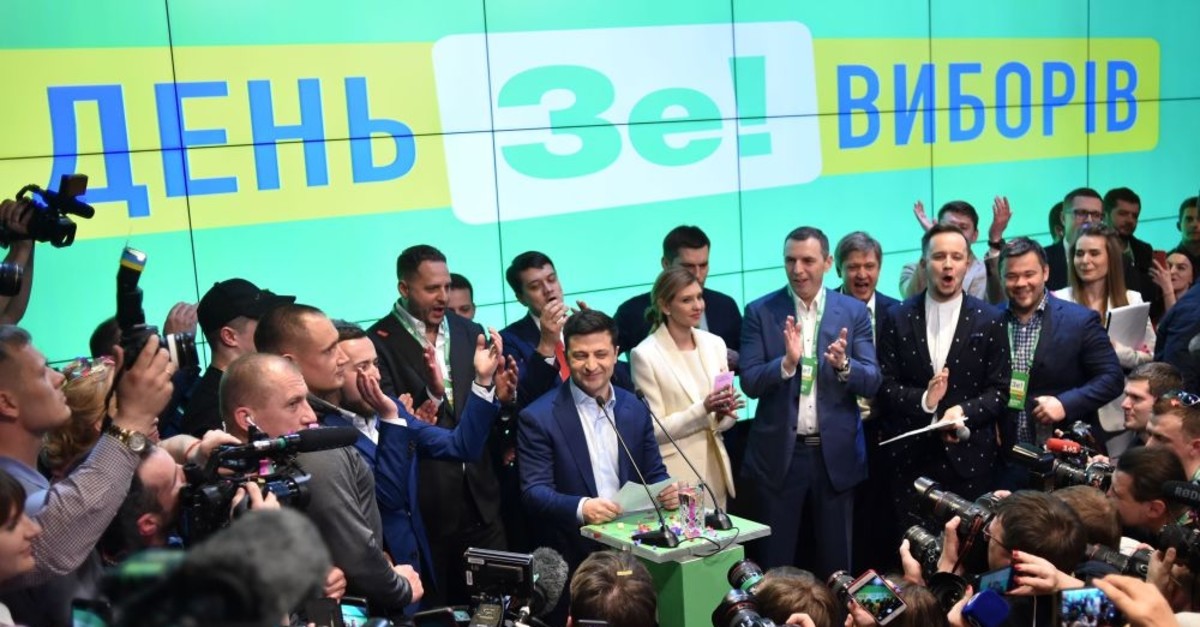 Ukrainian comedian and presidential candidate Volodymyr Zelensky gives a speech after the announcement of the first exit poll results in the second round of Ukraine's presidential election at his campaign headquarters in Kiev, April 21, 2019.