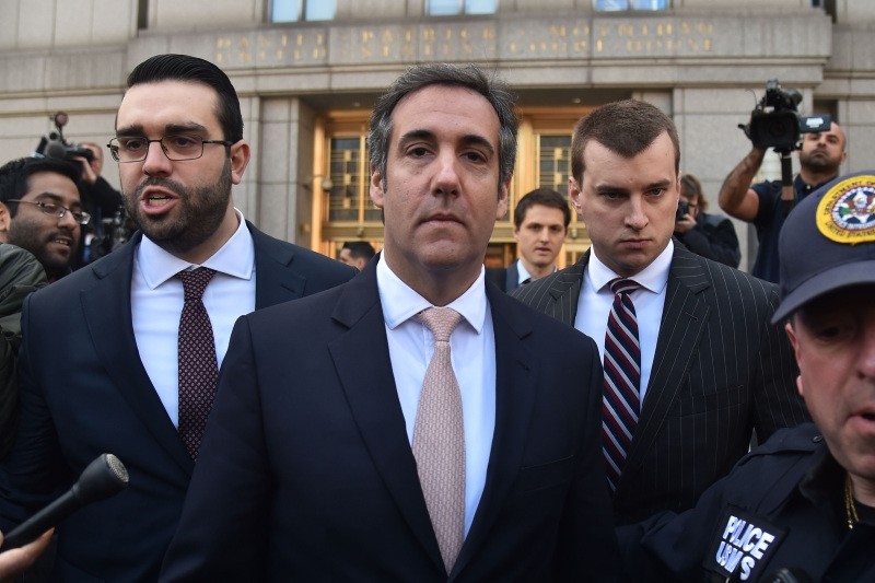 In this file photo taken on April 26, 2018 US President Donald Trump's personal lawyer Michael Cohen(C) leaves the U.S. Courthouse in New York on April 26, 2018. (AFP Photo) 