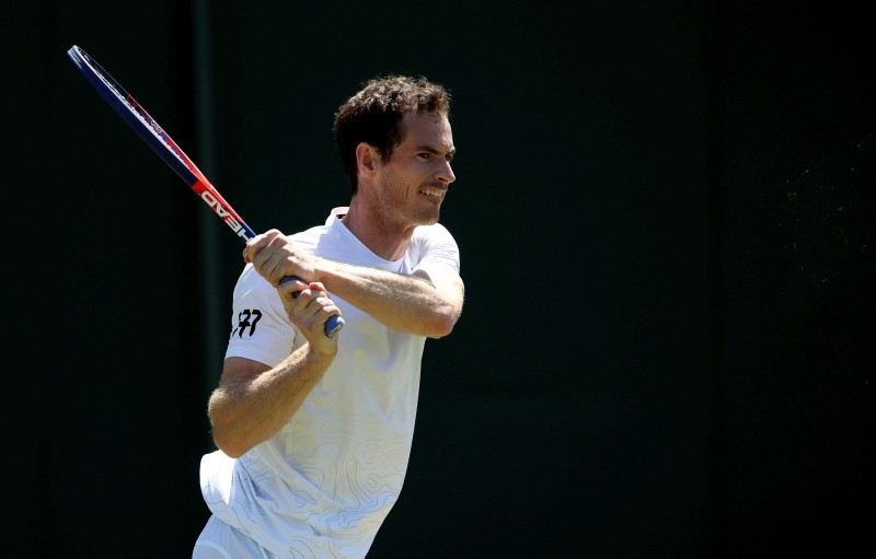 Andy Murray practices on a practice court Saturday June 30, 2018, ahead of the start of the 2018 Wimbledon Championships in Wimbledon, London. (PA via AP)