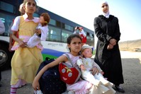 Girls that were evacuated from the besieged Damascus suburb of Daraya arrive to a camp inside Herjalleh suburb of Damascus, August 27, 2016. (REUTERS Photo)
