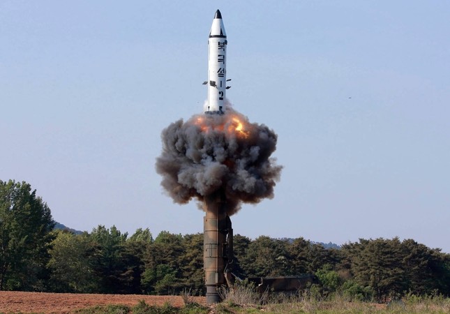 In this undated file photo distributed by the North Korean government on May 22, 2017, a solid-fuel Pukguksong-2 missile lifts off during its launch test at an undisclosed location in North Korea. (AP Photo)