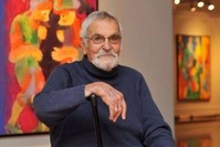 Sheikh Tosun Bayrak al Jerrahi al-Halveti in the winter of his long and dynamic life, surrounded by his artworks (photo courtesy of Medical Aid for Palestinians).