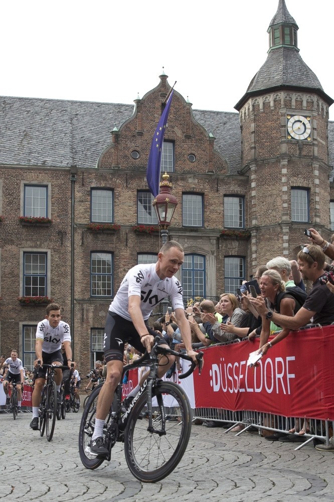 Britainu2019s Chris Froome rides during the team presentation of the Tour de France cycling race in the center of Duesseldorf, Germany.