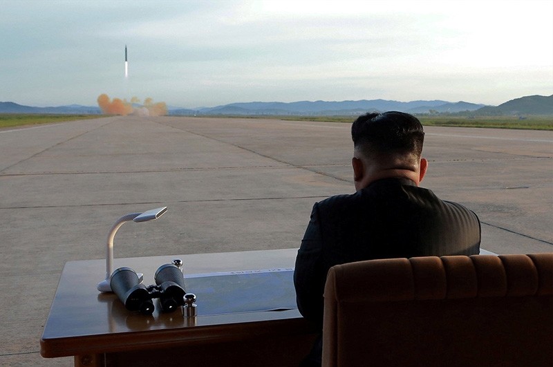 North Korean leader Kim Jong Un watches the launch of a Hwasong-12 missile in this undated photo released by North Korea's Korean Central News Agency (KCNA), Sept. 16, 2017. (via Reuters)