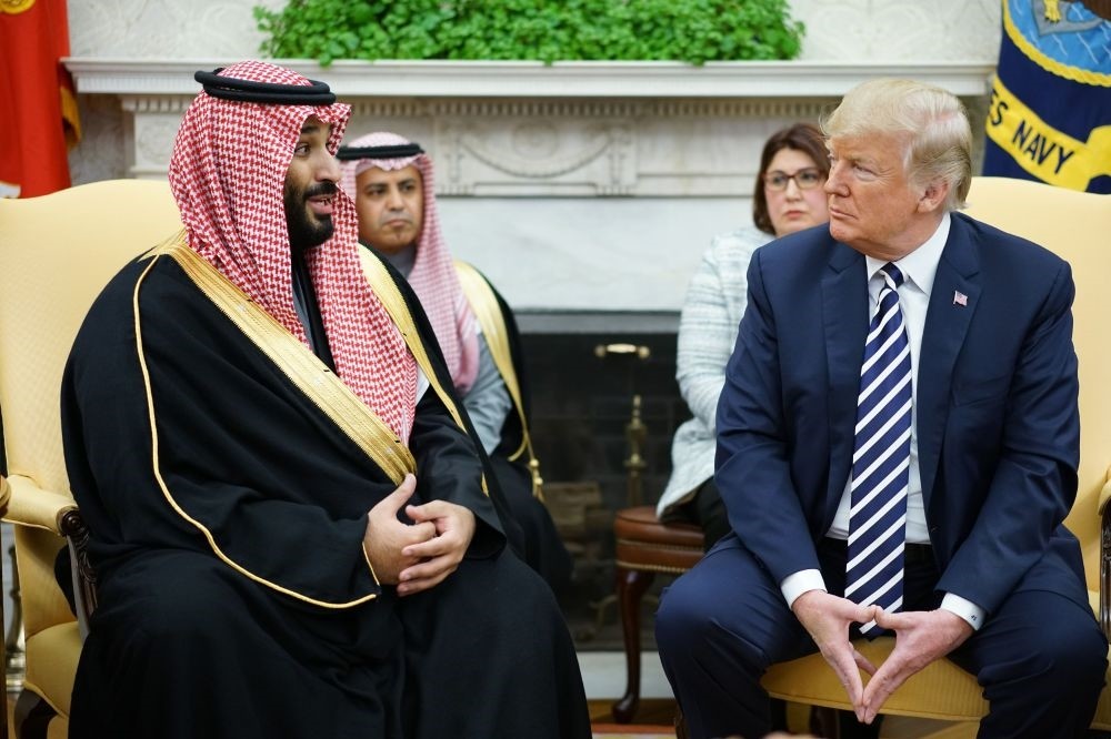 Saudi Arabia's Crown Prince Mohammed bin Salman (L) speaks during a meeting with U.S. President Donald Trump (R) in the Oval Office of the White House, Washington, March 20. 