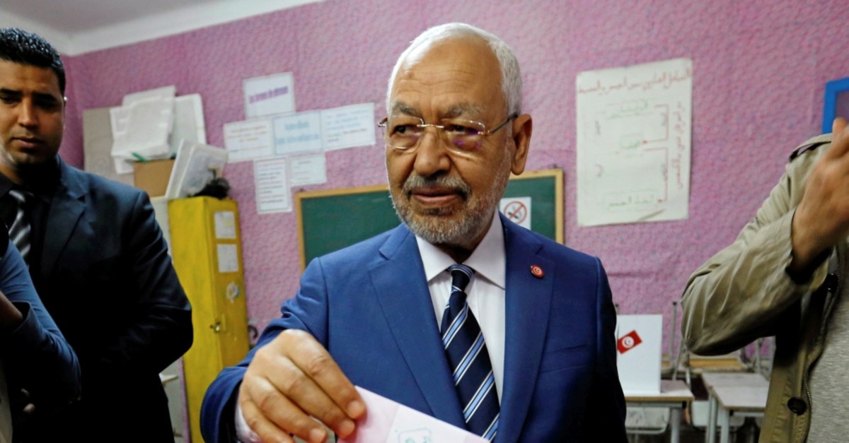 Rached Ghannouchi, the head of the Ennahda Party, casts his vote at a polling station for the municipal election, Tunis, May 6, 2018.