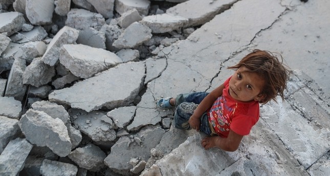 طفلة سورية في بلدة النشابية، الغوطةEPA