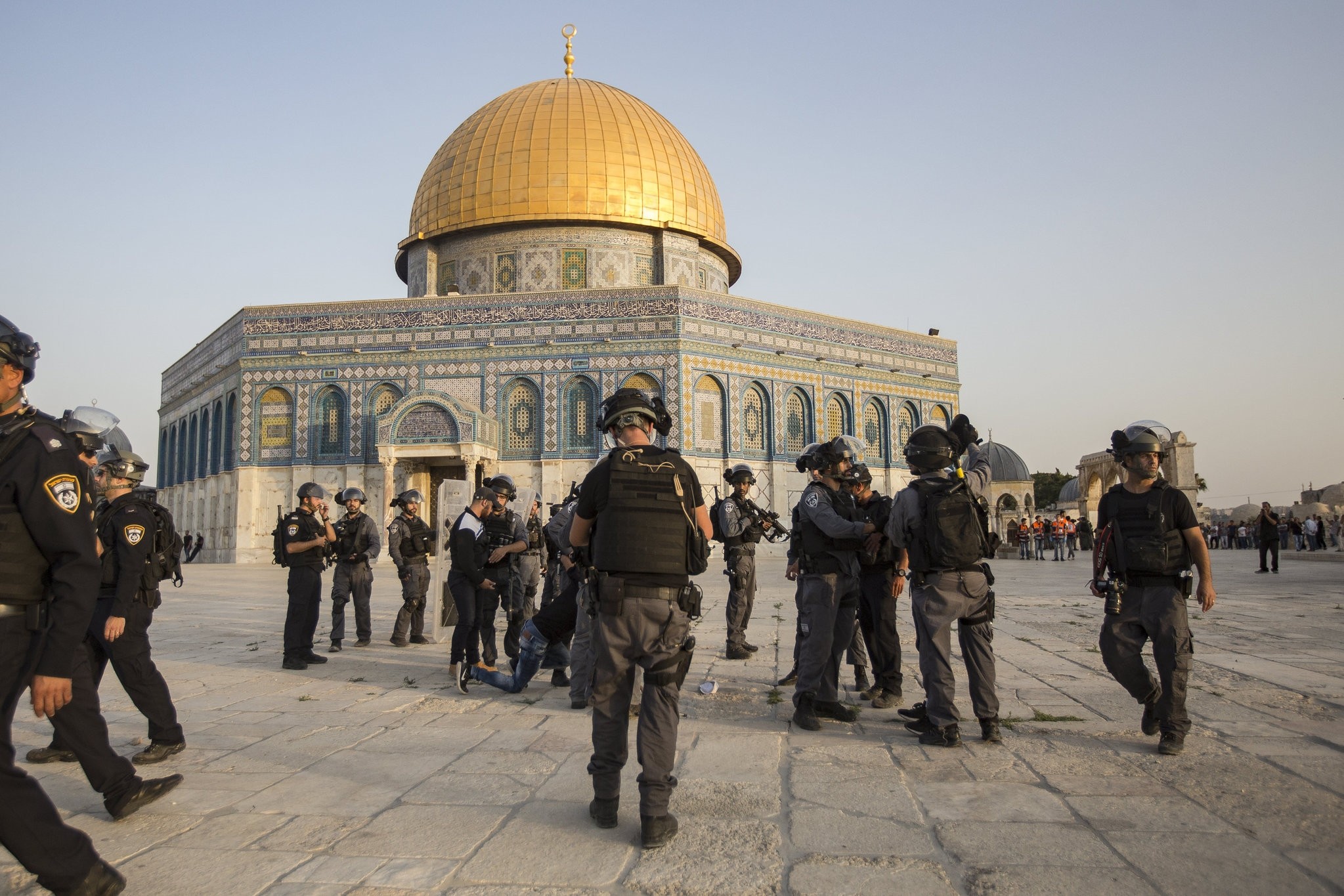 Israeli riot police take up positions next to Dome of the Rock at the Al-Aqsa Mosque compound in the Old City of Jerusalem, 27 July 2017, (EPA Photo). 