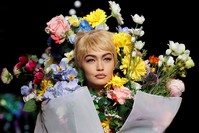 Gigi Hadid wears a creation as part of the Moschino women's Fall/Winter 2018/19 fashion collection, presented in Milan, Italy. (AP Photo)