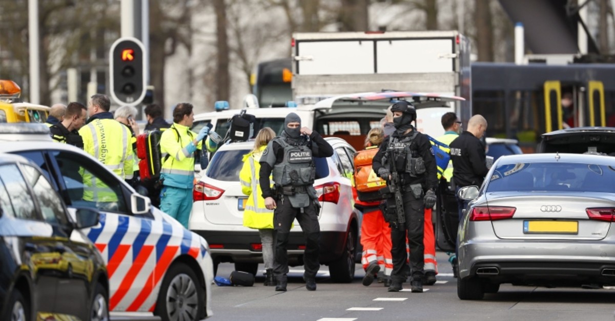 Emergency services stand at the 24 Oktoberplace in Utrecht, on March 18, 2019 where a shooting took place. (AFP Photo)