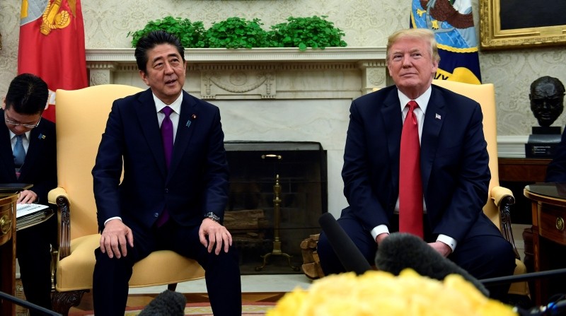U.S. President Donald Trump (R) with Japanese Prime Minister Shinzo Abe. (AP Photo)