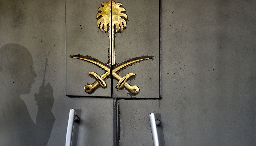 The shadow of a member of the security staff at the Saudi Consulate in Istanbul falls across the door of the consulate building, Nov. 1.