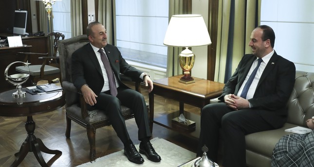جاوش أوغلو يبحث مع نصر الحريري خطوات تركيا لحل الأزمة السورية