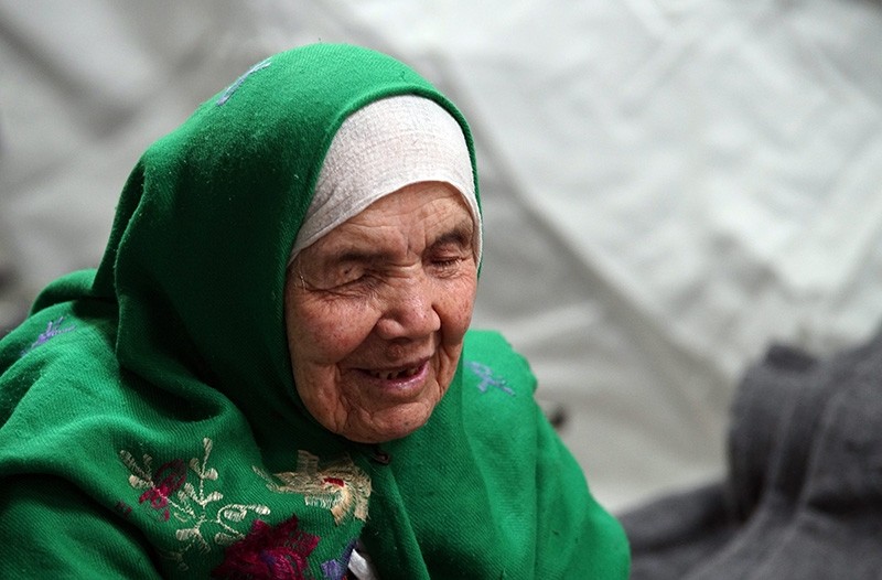 105-year old Afghan refugee Bibikhal Uzbek from Kunduz, Afghanistan, rests in Croatia's main refugee camp at Opatovac, Croatia, near the border with Serbia, Tuesday, Oct. 27, 2015. (AP Photo)