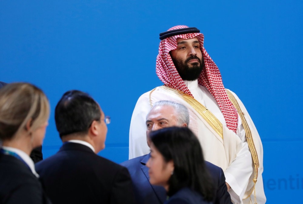 Saudi Crown Prince Mohammed bin Salman looks on as leaders arrive for a family photo at the G20 summit in Buenos Aires, Argentina Nov. 30.