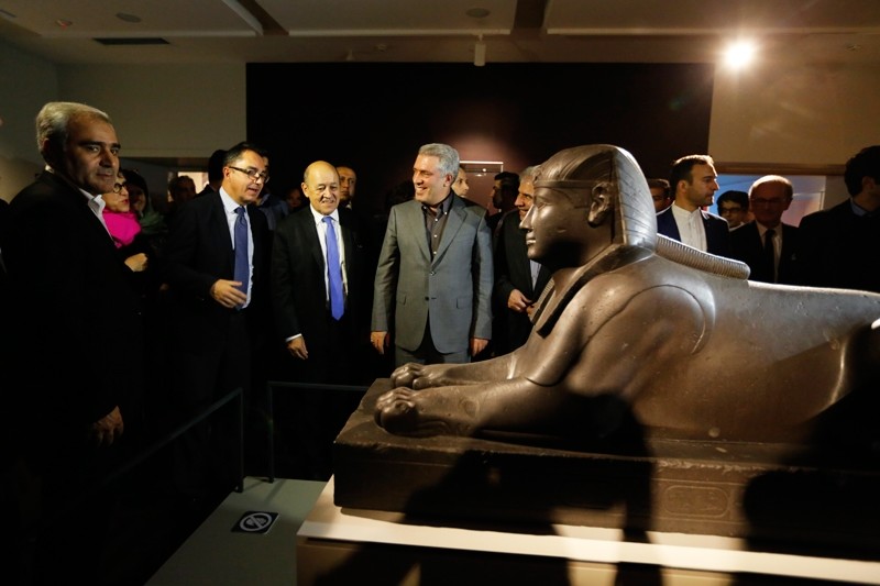 French Foreign Minister Jean-Yves Le Drian (C) and Vice President of Iran Head of Cultural Heritage Ali Asghar Mounesan (C-R) and Louvre museum President Jean-Luc Martinez (C-L) tour an exhibition of 50 artworks from the Louvre (EPA Photo)