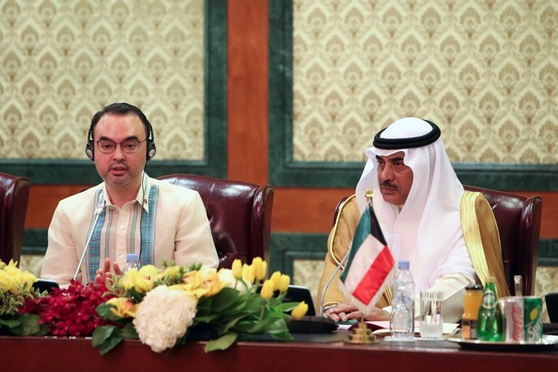 Secretary of Foreign Affairs of the Philippines Alan Peter Cayetano and Kuwaiti Deputy Prime Minister and Minister of Foreign Affairs Sheikh Sabah Al-Khaled Al-Hamad Al-Sabah hold a press conference in Kuwait City on Friday, May 11, 2018. (AP Photo)