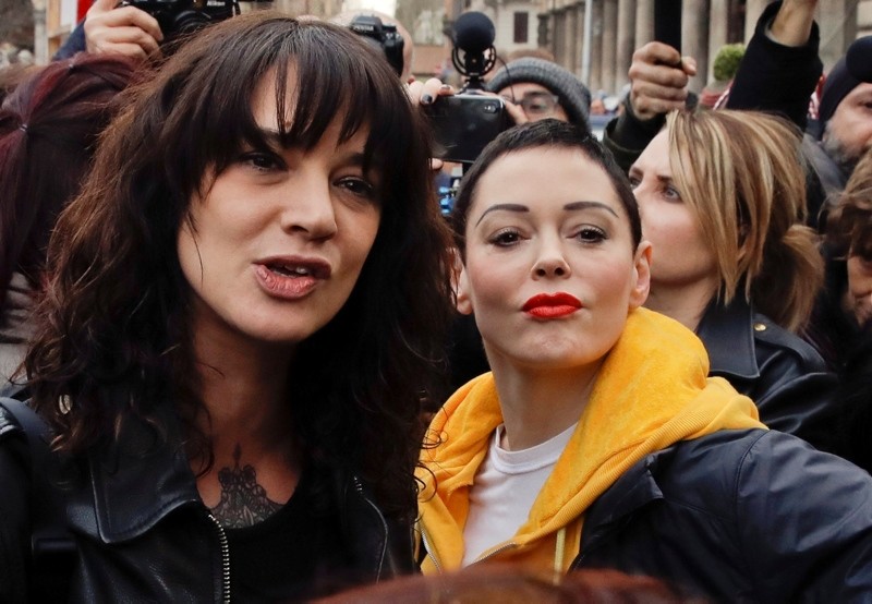 Actresses Asia Argento, left, and Rose McGowan participate in a demonstration to mark the International Women's Day in Rome, Thursday, March 8, 2018. (AP Photo)