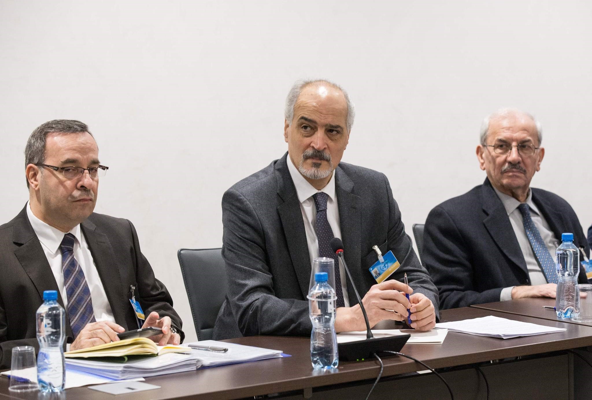 Syrian Ambassador to the UN and head of the regime delegation Bashar al-Jaafari (C) attends a meeting during the Intra-Syrian talks in Geneva on November 30, 2017. (AFP Photo)