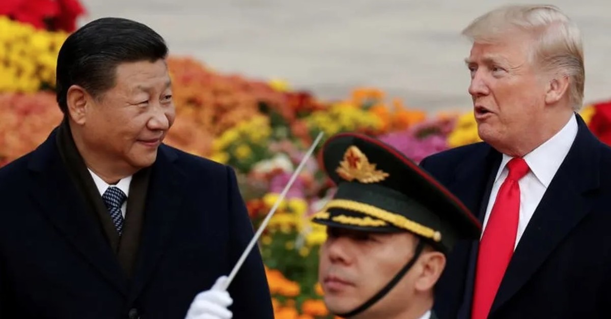 U.S. President Donald Trump takes part in a welcoming ceremony with Chinau2019s President Xi Jinping at the Great Hall of the People in Beijing, China, Nov. 9, 2017. 