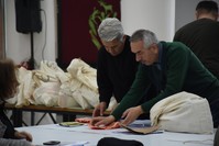Representatives from the different parties recount the votes in districts where unofficial results are being challenged, April 2, 2019.