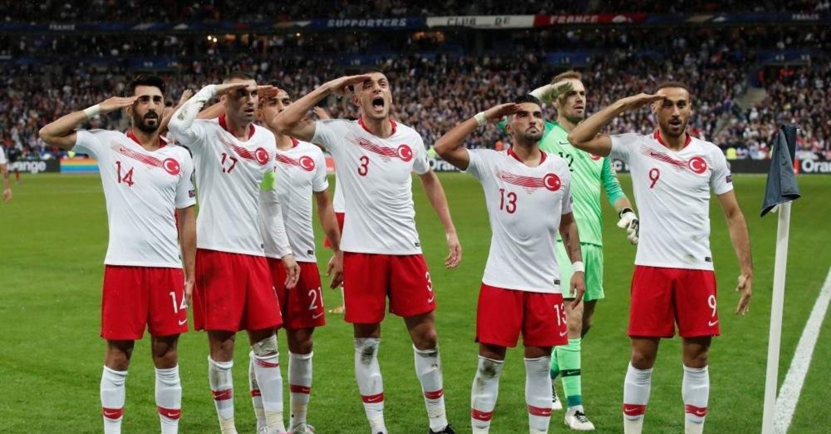 Turkish players salute after Kaan Ayhan celebrates scoring their first goal against France, Saint-Denis, Oct. 14, 2019. (REUTERS Photo) 