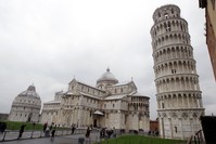 The Leaning Tower of Pisa (Torre di Pisa) is seen at right next to the medieval cathedral of Pisa, in Piazza dei Miracoli Square, in Pisa, Italy, Sunday, Jan. 2, 2012. (AP Photo)