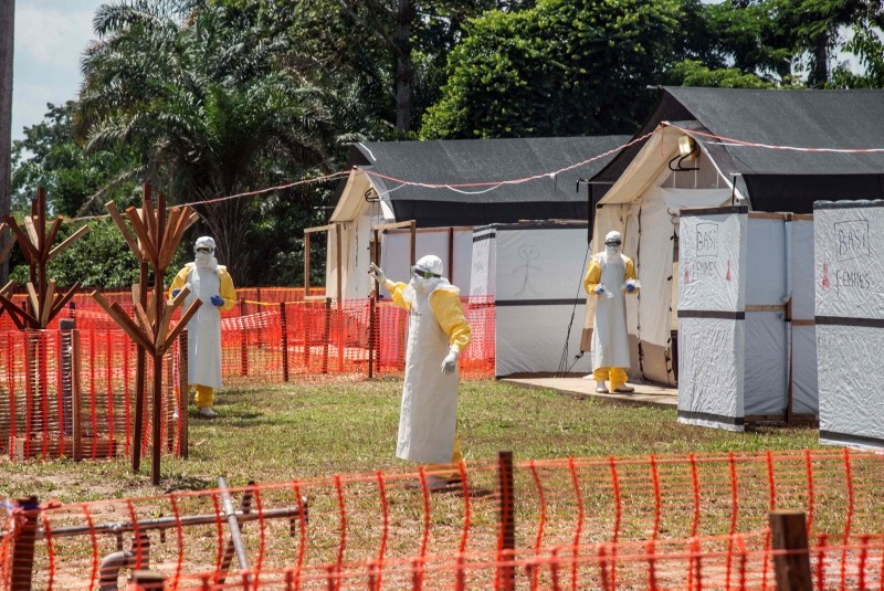 In this file photo taken on June 1, 2018 health workers operate within an Ebola safety zone in the Health Center in Iyonda, near Mbandaka. (AFP Photo)