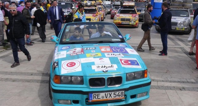 Participants get ready to kick off the next stage to the rally at a square in Uşak.