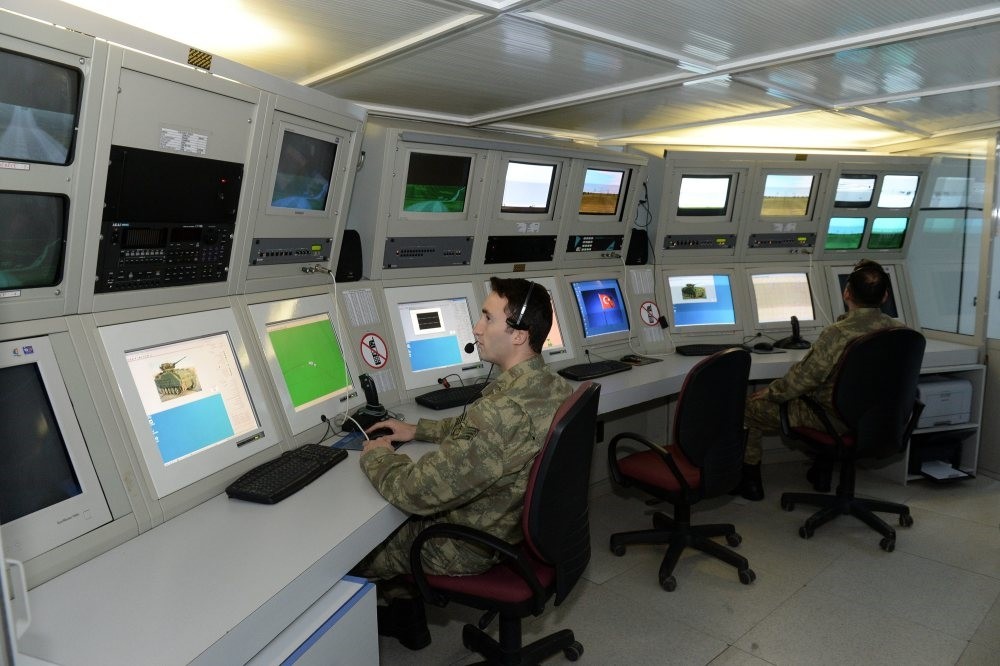 Soldiers at a simulator trainings for armored combat vehicles developed by Turkey's Havelsan, a military software development company.