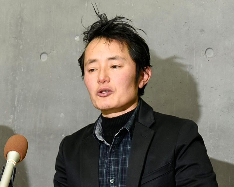 In this Thursday, Jan. 24, 2019, photo, Takakito Usui, a transgender man, cries while speaking during a press conference after Japan's Supreme Court handed down in Okayama, western Japan. (AP Photo)