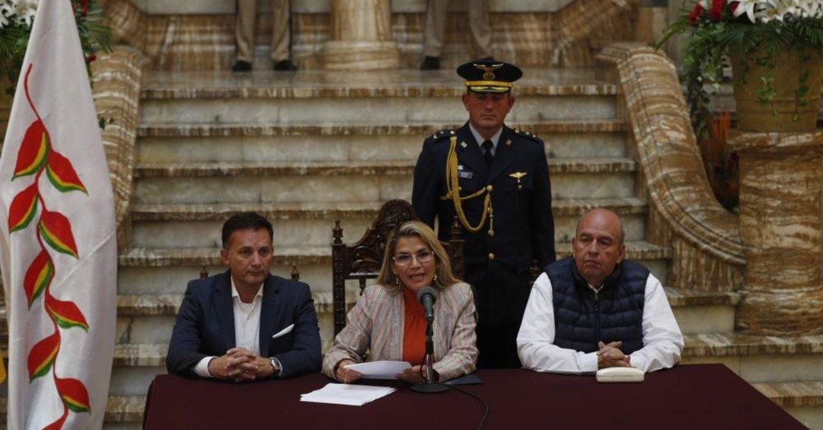 Bolivia's interim President Jeanine Anez (C) speaks during a press conference at the presidential palace, La Paz, Nov. 28, 2019. (AP Photo)