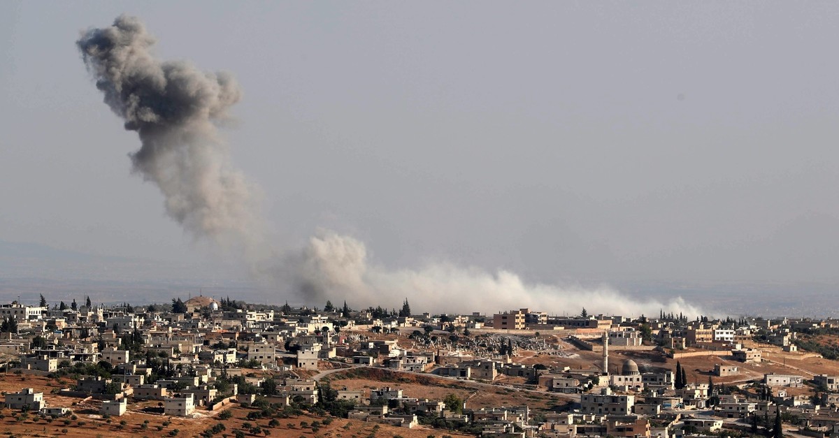 Smoke billows following deadly regime airstrikes on the village of Kafr Sajna on the southern outskirts of Syria's Idlib province, August 16, 2019.