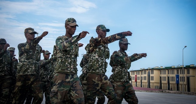 Somali soldiers march during military training.
