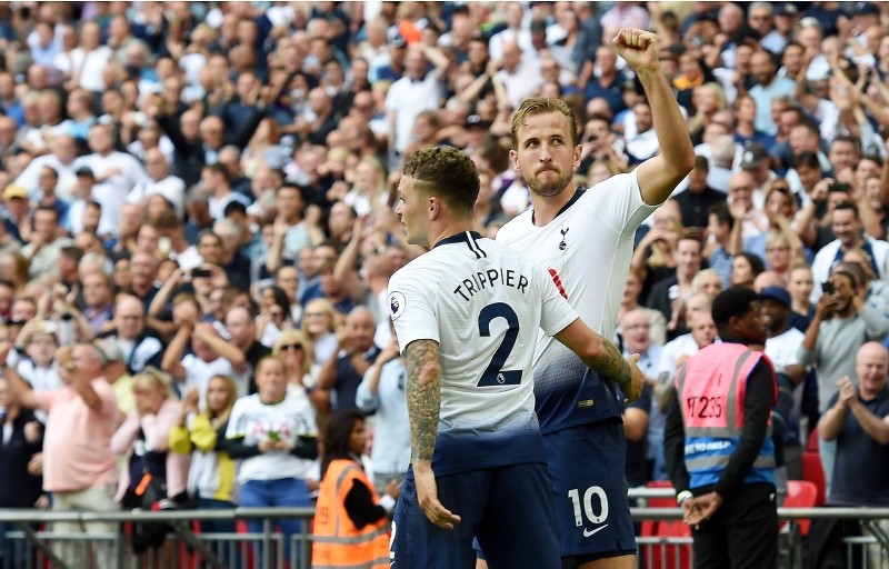 Tottenham's Harry Kane (R) celebrates after scoring his teams third goal against Fulham during the English Premier League soccer match at Wembley Stadium in London, Britain, 18 August 2018. (EPA Photo)