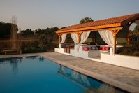 The Ionia Guest House currently has two spacious rooms with ensuite bathrooms and private verandas. There is also a swimming pool with a large terrace, and an adjoining cafu00e9 surrounded by olive groves overlooking the village of Hu0131du0131rbeyli.