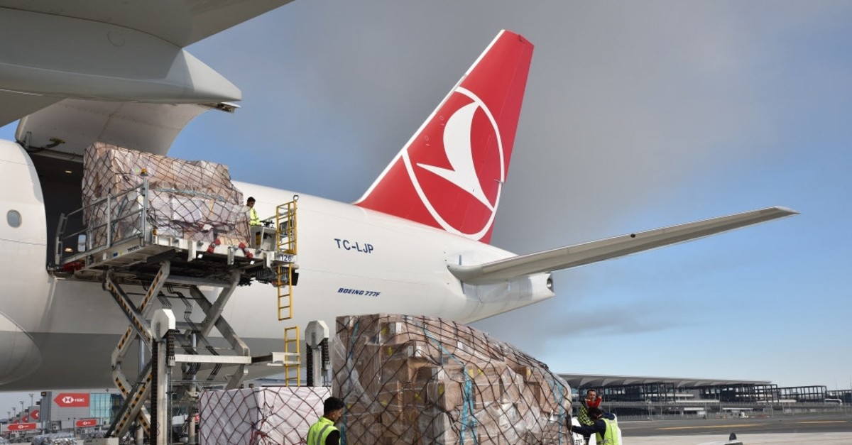 Workers unload cargo from a Turkish Cargo aircraft at Istanbul Airport, March 20, 2019.