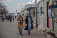 Duha Sahaf (R), mother of two, and her sister Sece Yunus (L) are studying at Siirt University.