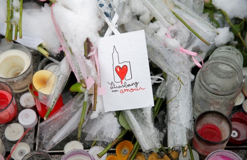 A drawing representing Strasbourg's cathedral is seen at an improvised memorial in tribute to the victims the shooting in Strasbourg, France, December 16, 2018. The sign reads ,Strasbourg my love,. (REUTERS Photo)